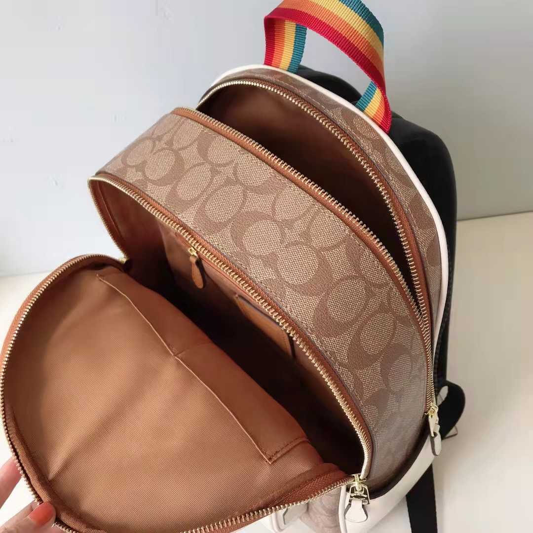 コーチ COACH シグネチャーキャンバス スヌーピーコラボバッグパック 
