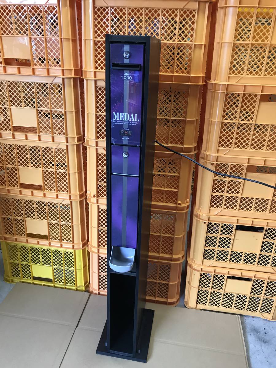 両替機　中古架台付　1000円→100円×10枚　令和6年新札対応　送料込 両替機 1000円→100円×10枚 中古架台付 領収書OK 令和6 領収書OKの通販