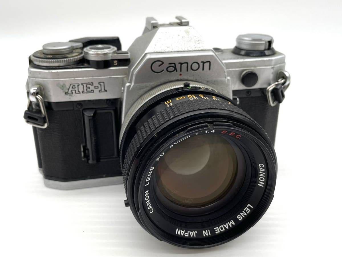AE-1 Canon 50mm FD Program with zoom bonus and f⁄1.8 w⁄ telephoto