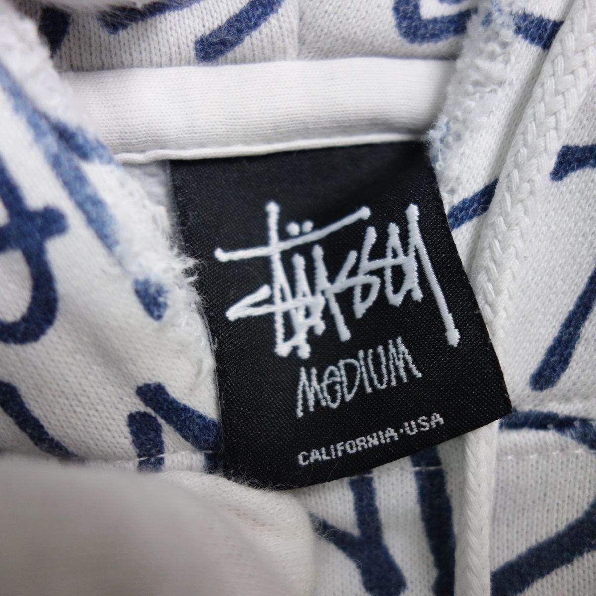 ステューシー STUSSY ロゴ総柄 スウェット プルオーバーパーカー 