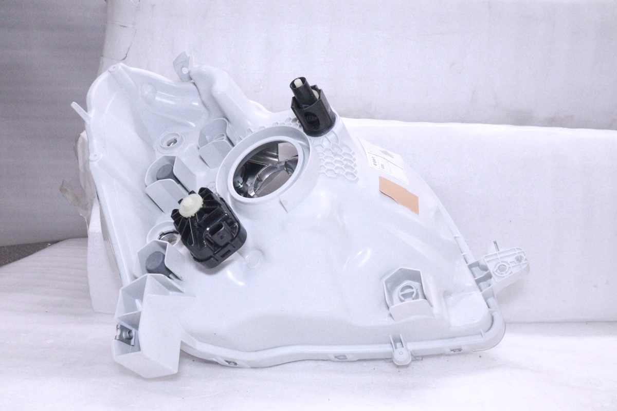32-122☆ハロゲン LA600S タント☆左ヘッドライト ICHIKOH 1880 打刻:T