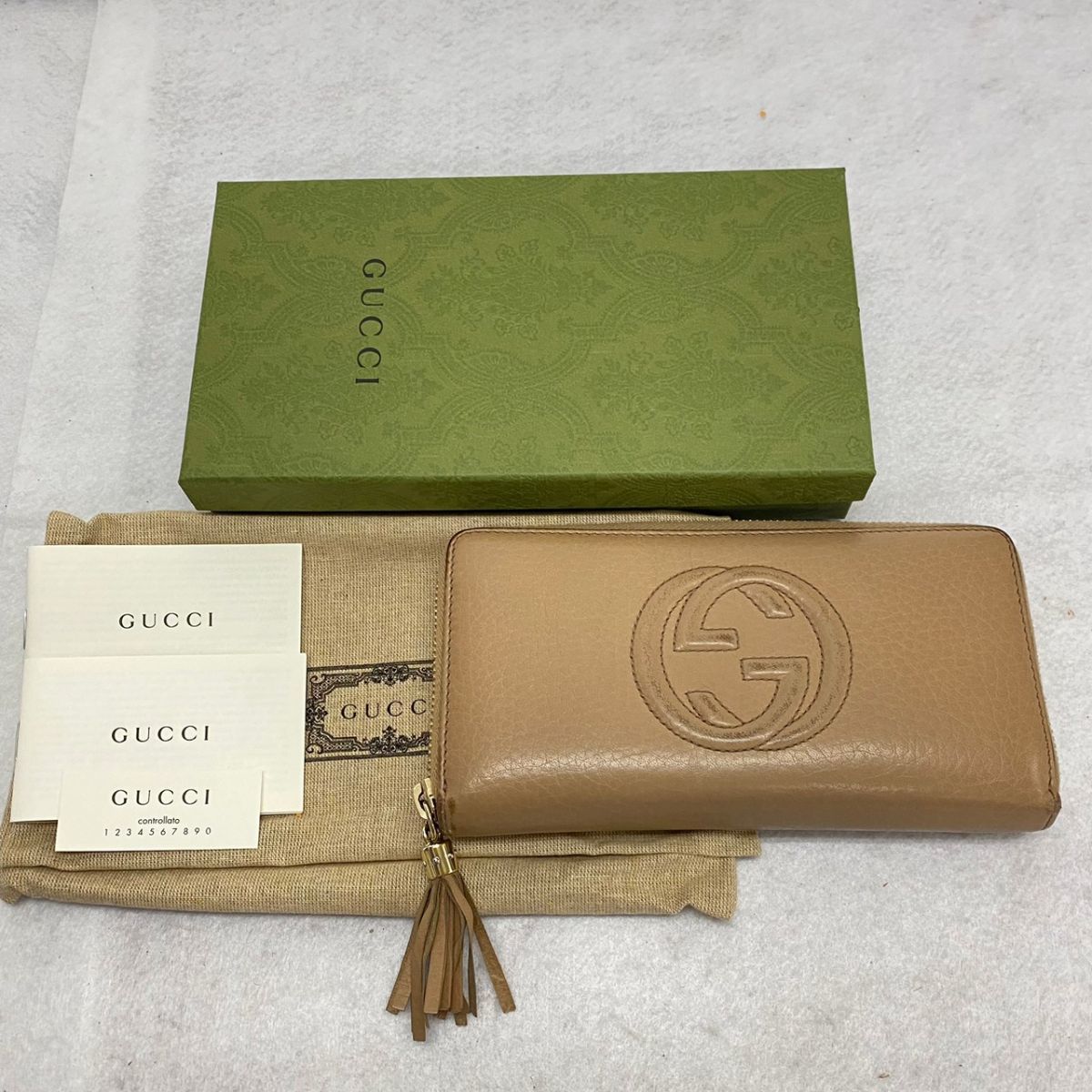 R328-O35-81 GUCCI グッチ 308004.1147 ラウンドファスナー 長財布 