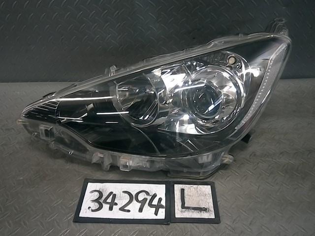 アクア DAA-NHP10 左ヘッドライトASSY G GS 082 コイト 52-244