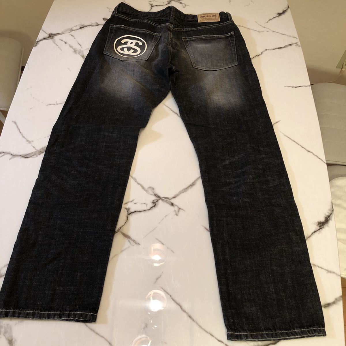 ステューシー デニム ジーンズ サイズ34 デニムパンツ 中古・古着通販 