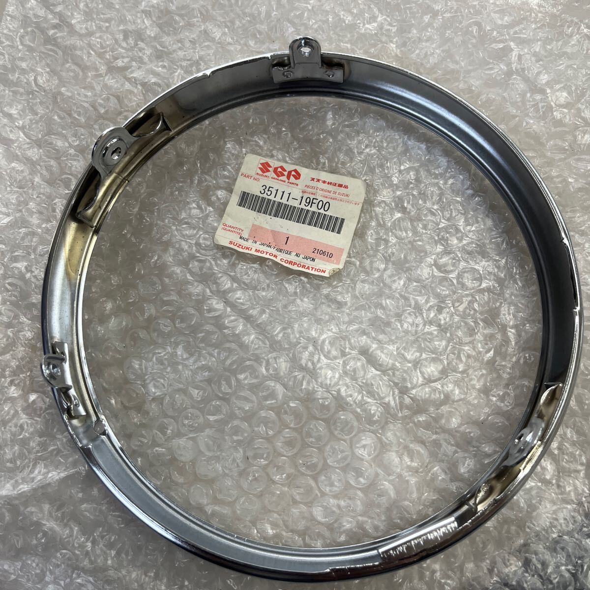 ご依頼品 スズキ純正新品ヘッドライトリム35111-19F00 インパルス バンディット