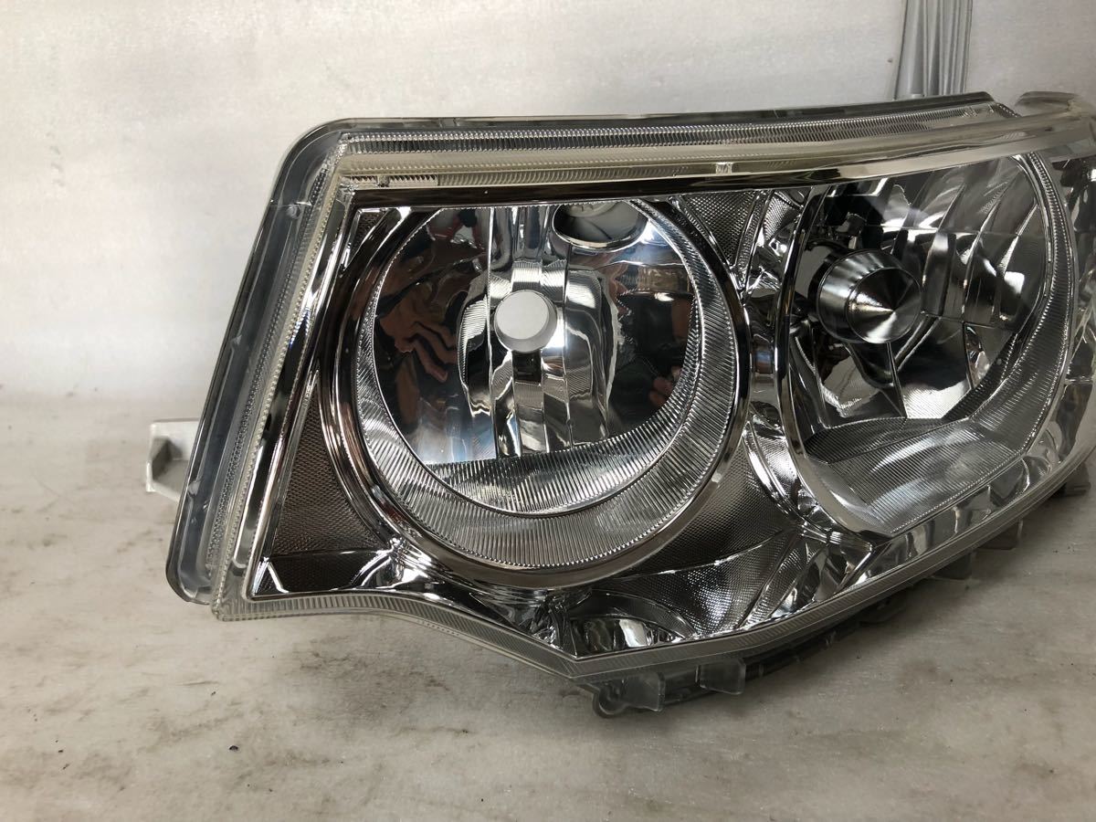 1197 タントカスタム L375S 左ヘッドライト HID レンズ綺麗 100-51944