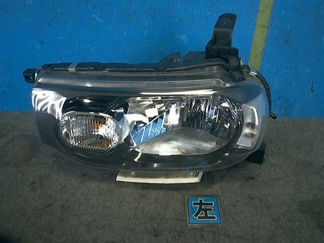 キューブDBA-Z12左ヘッドランプハロゲンSTANLEYP8190 [ZNo:02028357