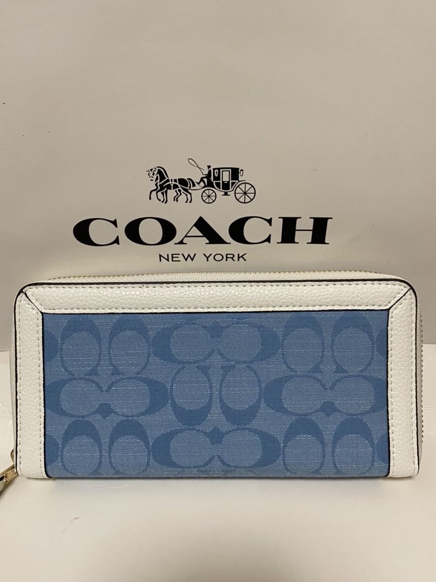COACH シグネチャー 長財布 新品未使用】1円コーチジッピーウォレット長財布シグネチャー水色 参考