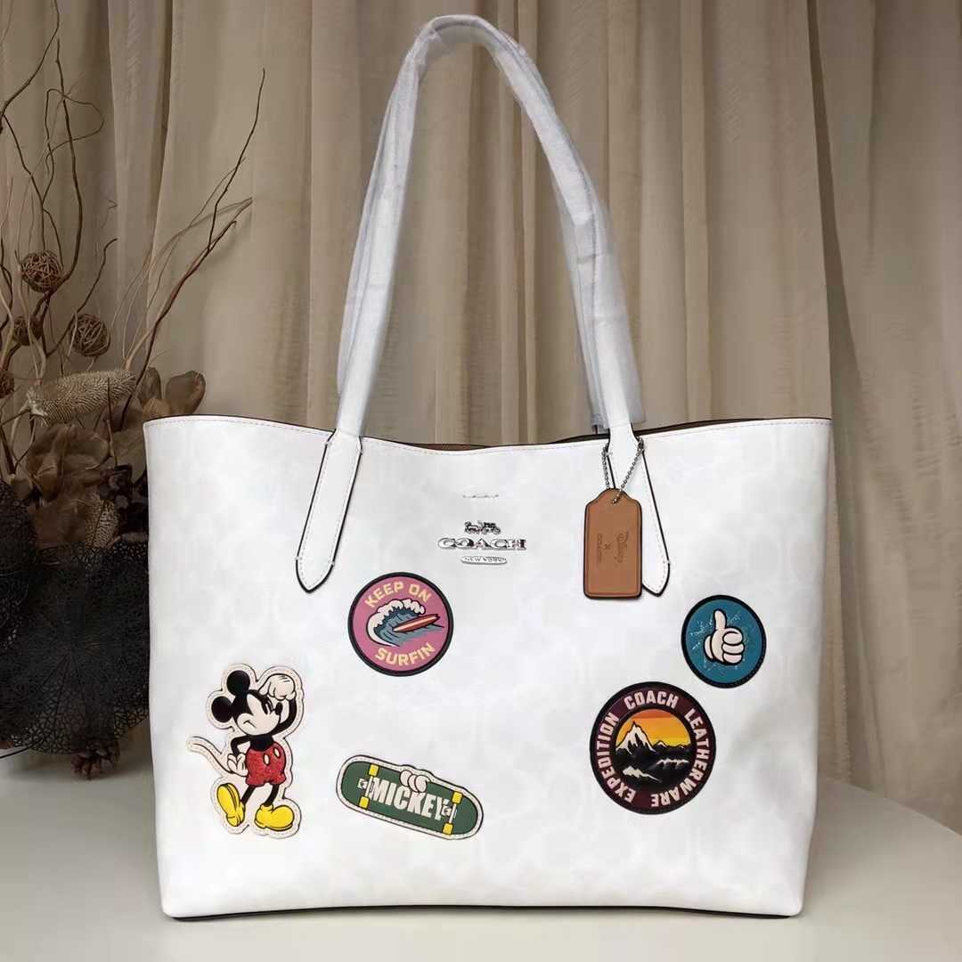 コーチCOACH×ディズニーコラボコラボ シグネチャー ミッキーパッチ 