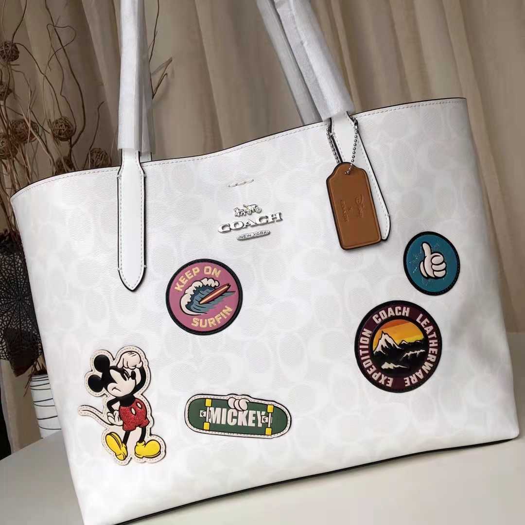 コーチCOACH×ディズニーコラボコラボ シグネチャー ミッキーパッチ 