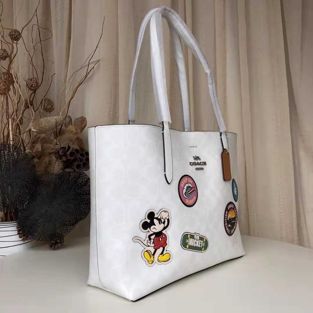 コーチCOACH×ディズニーコラボコラボ シグネチャー ミッキーパッチ 