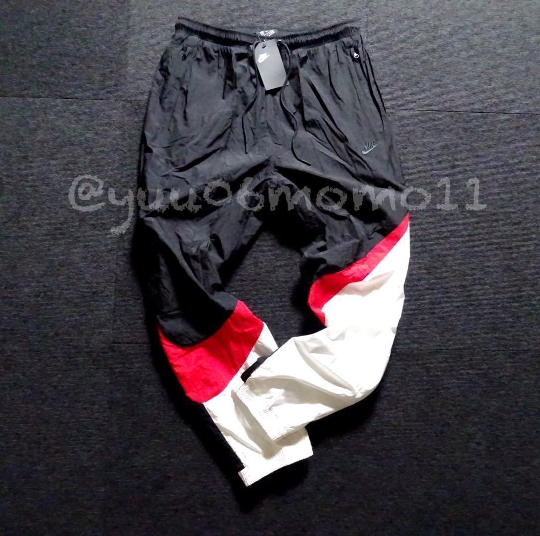 新品 正規品 サイズXL NIKE ナイキ ウィンドブレーカー ナイロンパンツ 黒 ブラック 赤 白 ビッグ SWOOSH 刺繍ロゴ