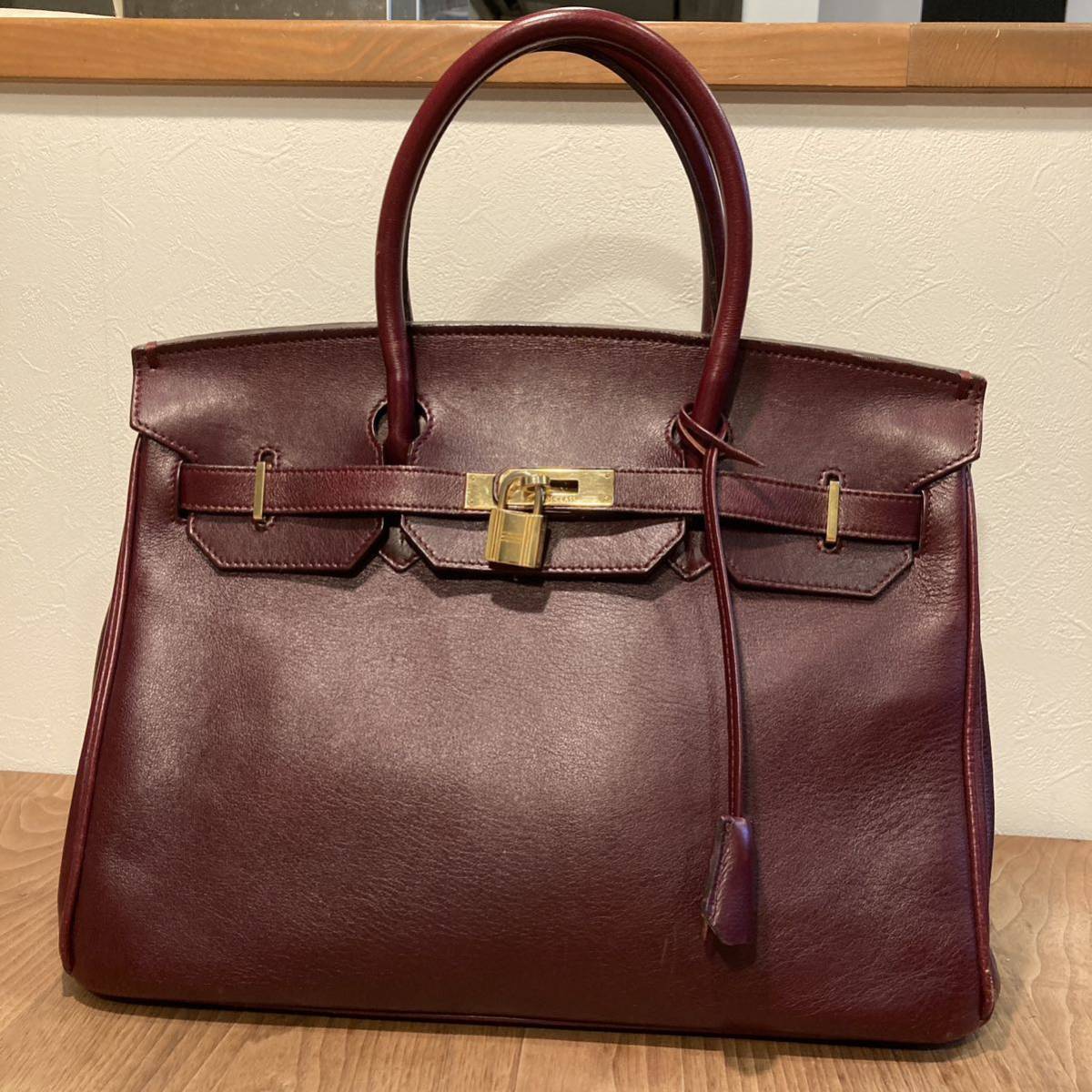 ハイクラス ハンドバッグ ワイン レザー 中古 ヘンリーハイクラス 