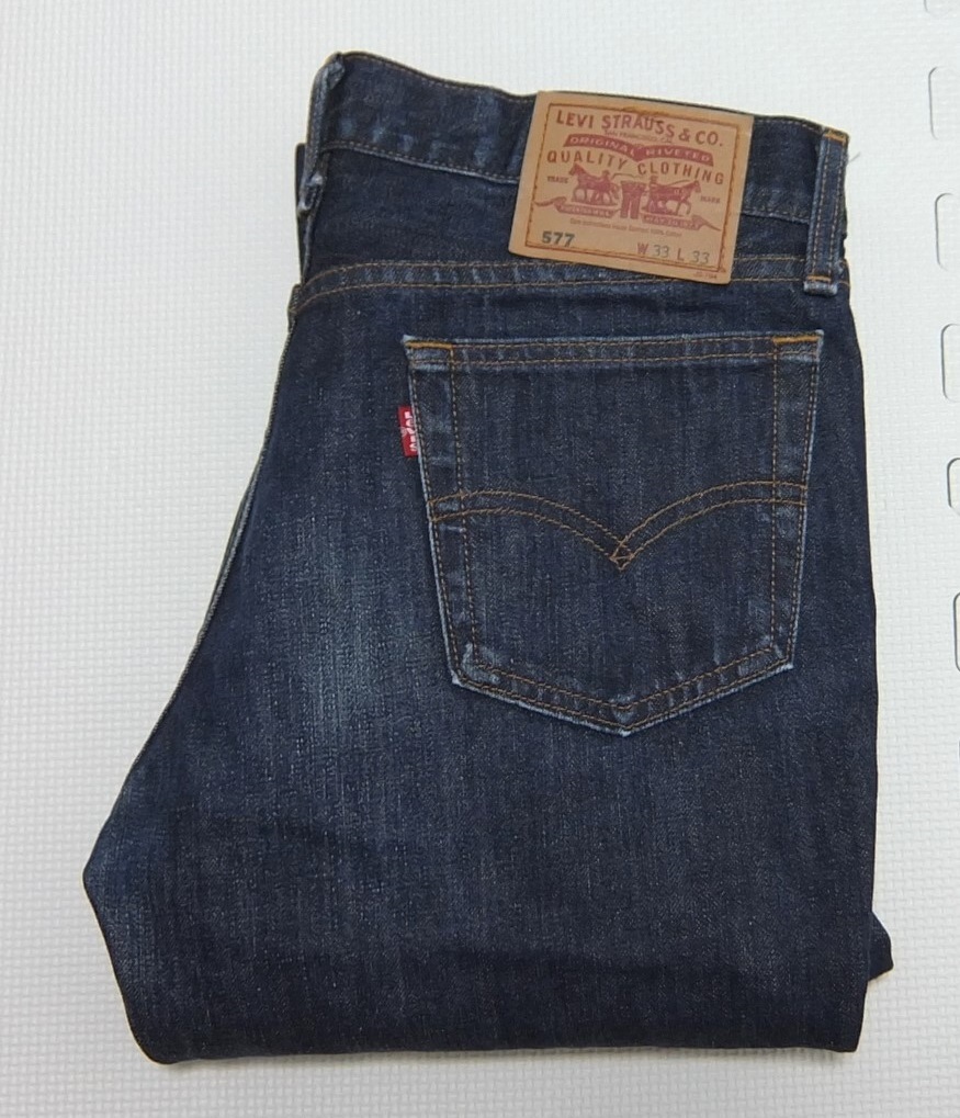 2001年 日本製 Levi's 577 ローライズ ブーツカット デニムパンツ 紺 W33 ボタンフライ 股浅い リーバイス