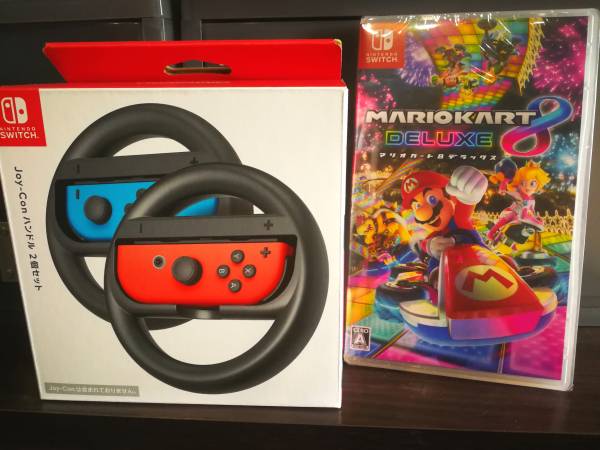 送料無料★即決★新品未使用 「マリオカート8デラックス」+「Joy-Conハンドル2個セット」*（任天堂）nintendo switch用*
