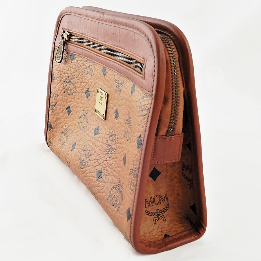MCM エムシーエム◆セカンドバッグ クラッチ コニャック ロゴ総柄 鞄 PVC★2081 MCM（セカンドバッグ&frasl;クラッチバッグ）のフリマアイテム一覧 MCM セカンドバッグ エムシーエム セカンドバッグの通販 バッグの通販