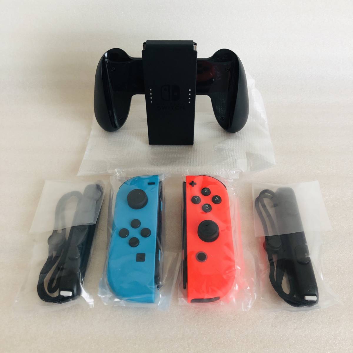 高品質，正規品 1円 Nintendo switch ジョイコンセット ネオンブルー ネオンレッド ジョイコングリップ付 ネオン 任天堂Switchスイッチ(ニンテンドースイッチアクセサリー)｜売買されたオークション情報、yahooの ニンテンドースイッチアクセサリー