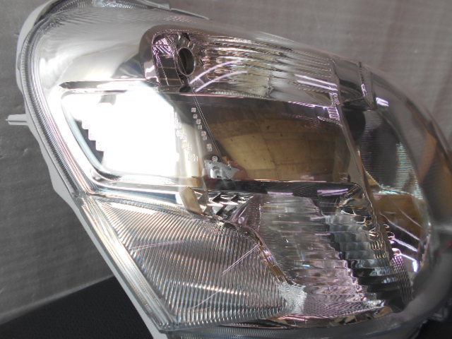 ④タント LA600S 左ヘッドライト ICHIKOH 1880