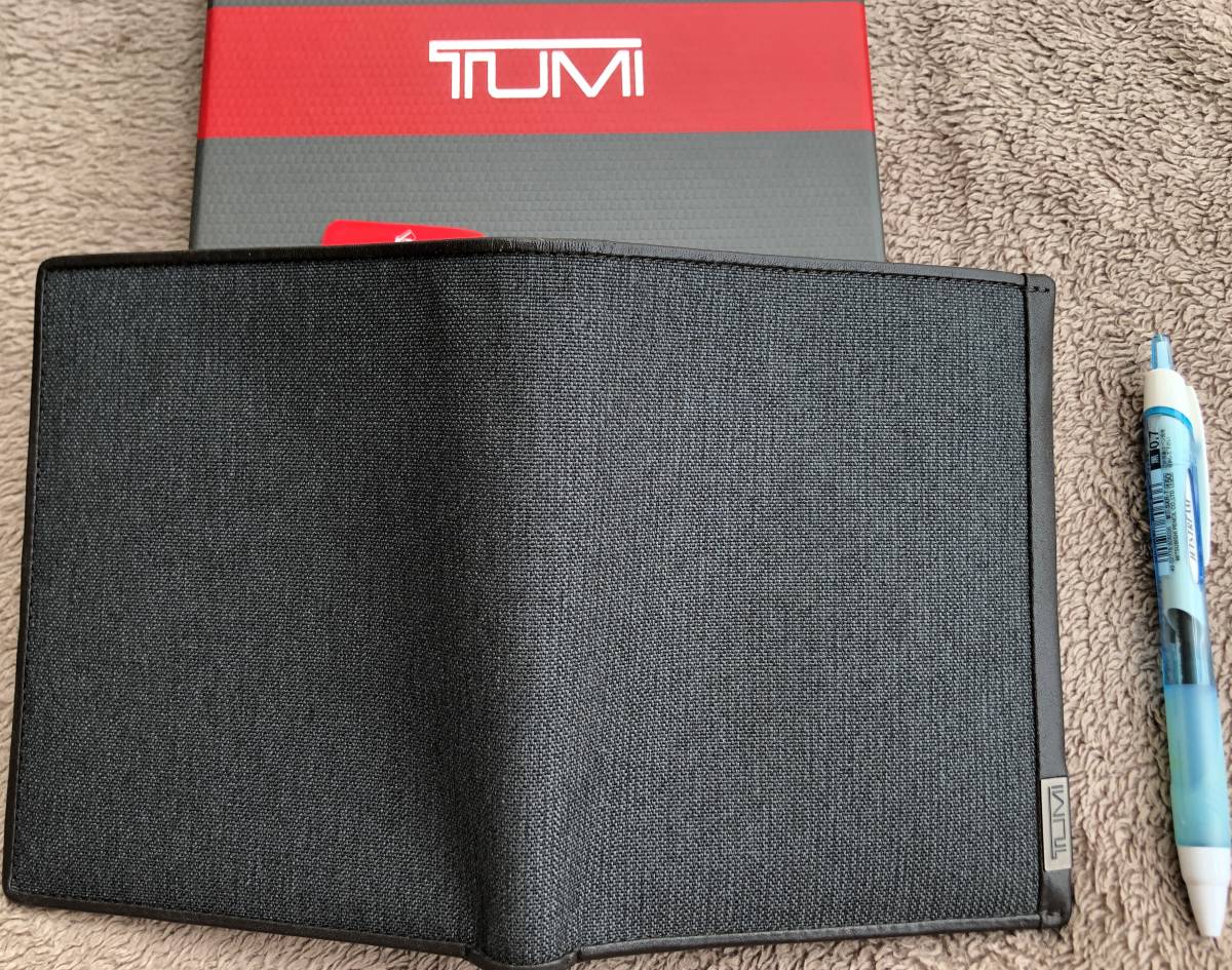 １．【新品未使用】【送料無料】TUMI パスポートケース１