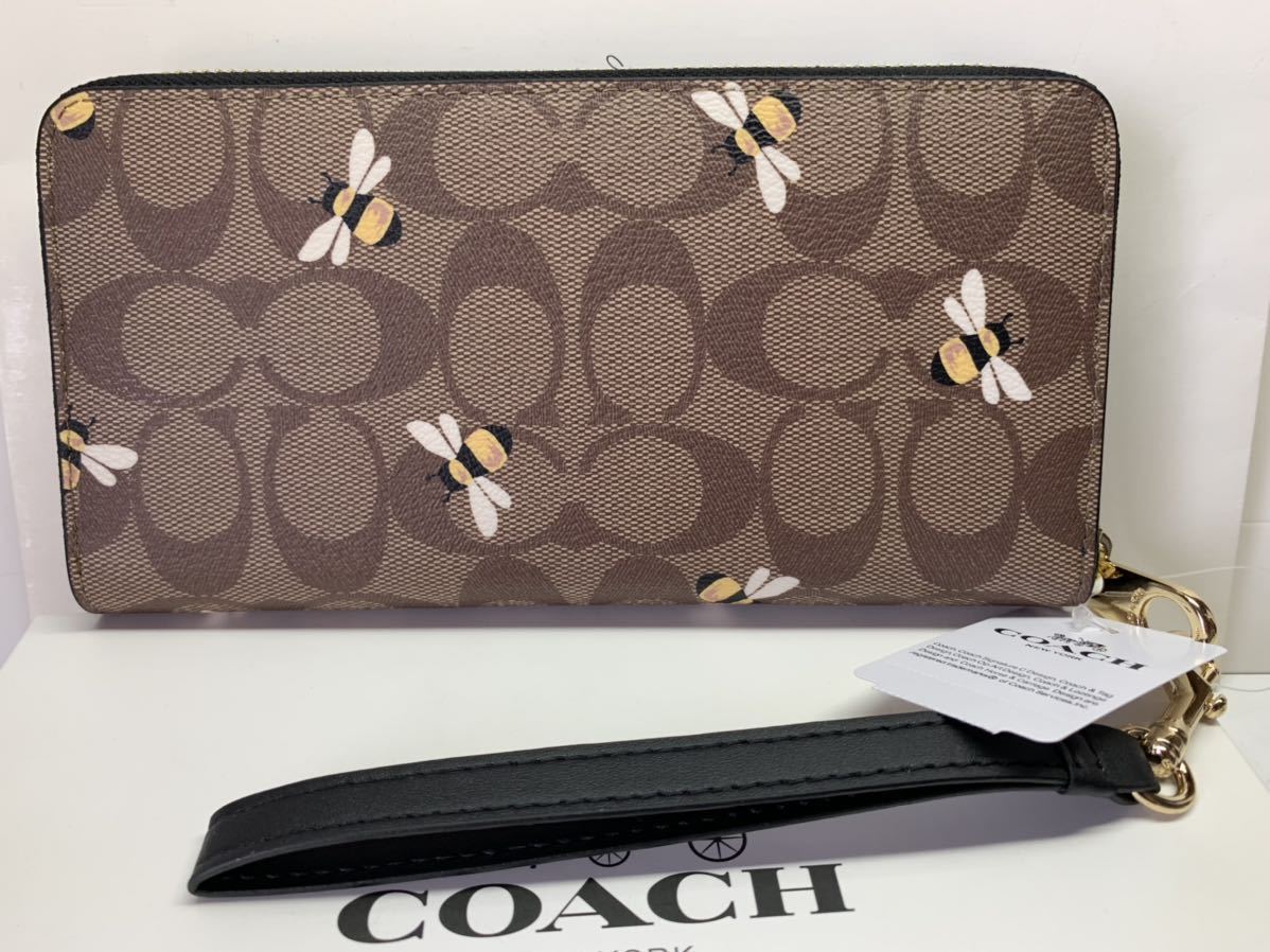 COACH 新品箱付き　長財布 C8675 PVC シグネチャー 蜂 ビー プリント ストラップ付き ラウンドファスナー アウトレット 翌日発送
