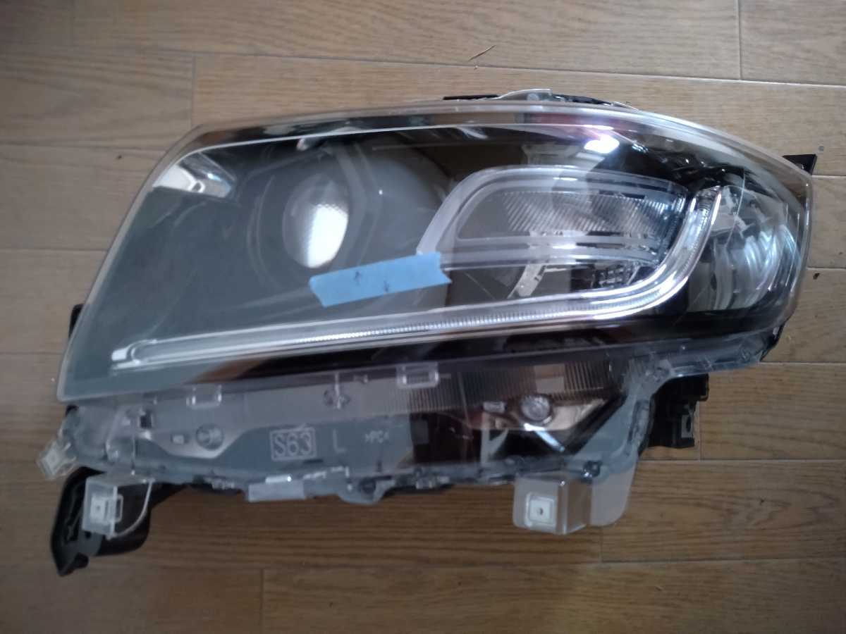 スペーシアカスタム 中古左ヘッドライトユニット MK53S