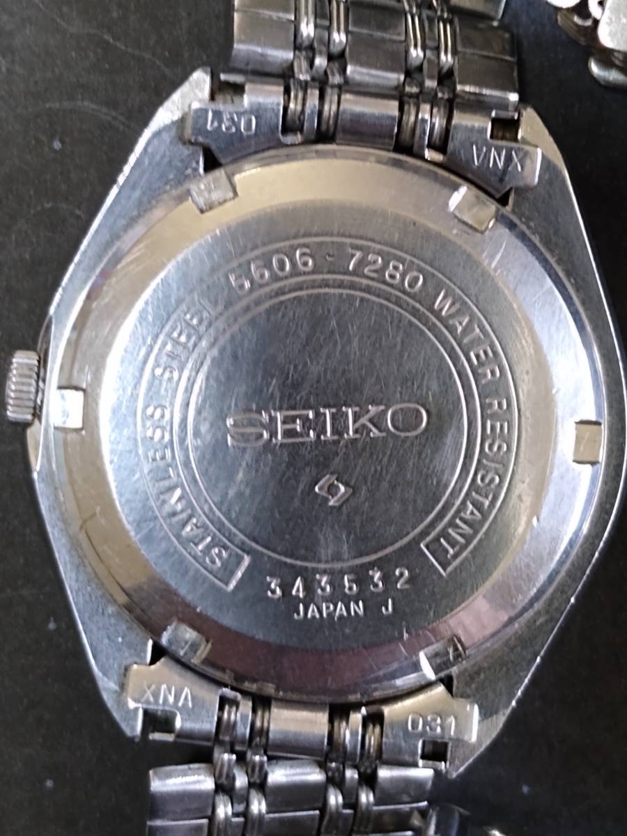 ジャンク SEIKO セイコ- 腕時計 5606-7280 青文字盤 カットガラス 23石