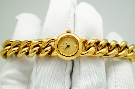 I141○作動良好 SEIKO セイコー 金文字盤 ラウンド型 1E20-0080  