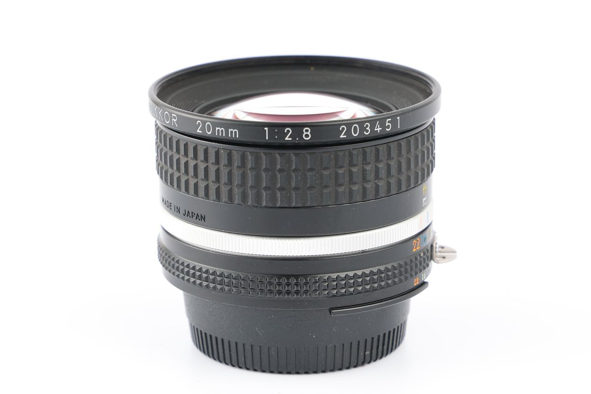 20mm Nikon NIKKOR f⁄2.8 Lens - f⁄4 Manual Focus Nikkor AI AIS Caps