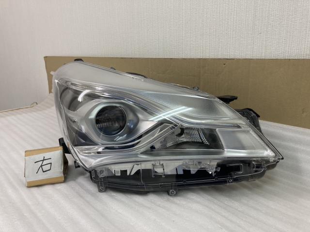 割と美品　　ヴィッツ NSP130 右ヘッドランプASSY コイト　KOITO　52-303　磨き済み　ツメ折れ無し　801125　 ヴィッツ ヘッドライト 81130-52D90 USヘッドライト USDM 北米仕様