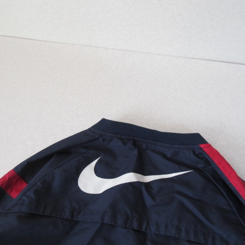 鹿島アントラーズNike ピステ・ウィンドブレーカー レッド/ネイビー