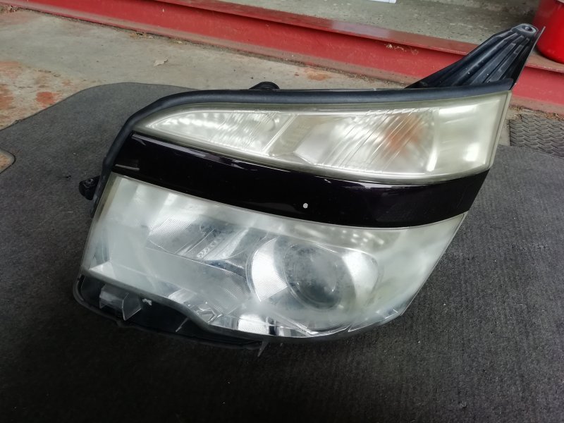 2013年 ヴォクシー ZRR70W 後期HID 左ヘッドライト KOITO 28-225