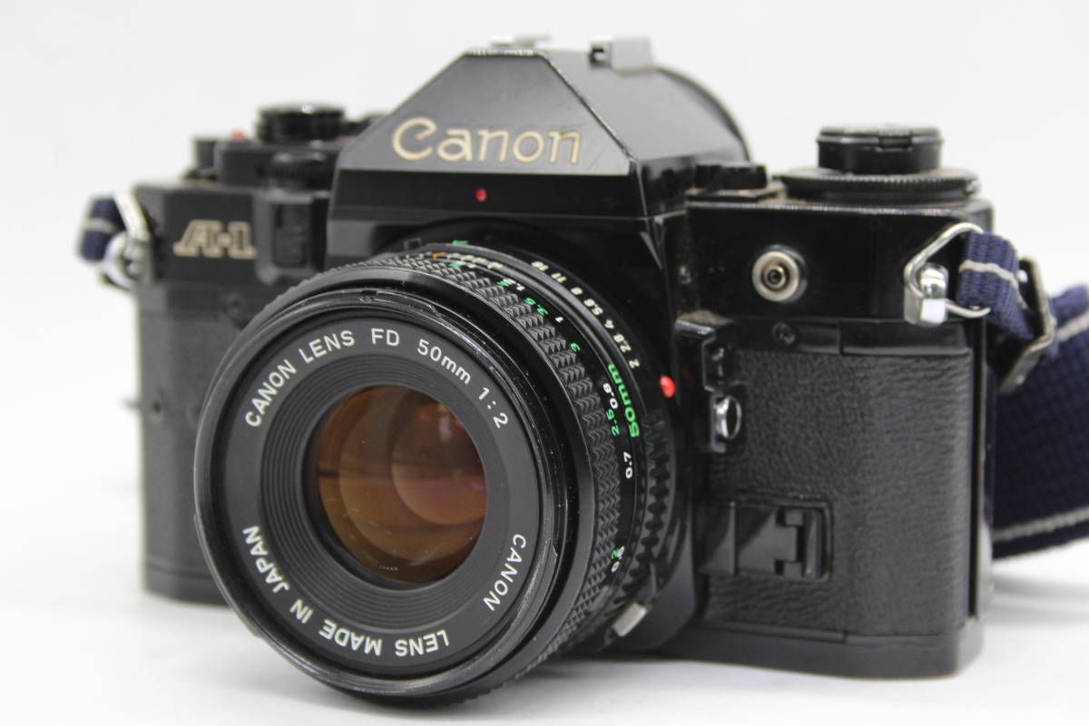 【返品保証】 キャノン Canon A-1 ブラックボディ FD 50mm F2 ボディレンズセット C7969