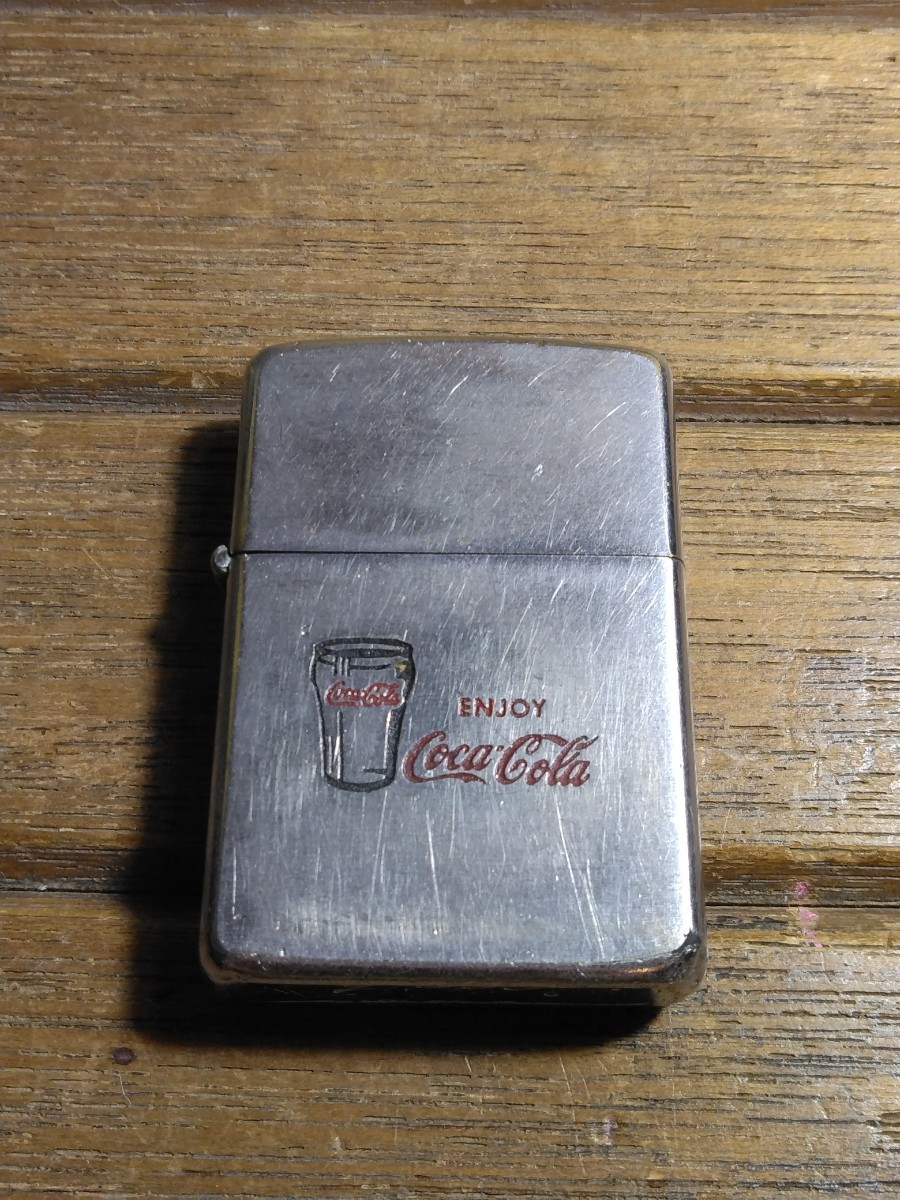 ビンテージ zippo 1976年スリム OMCO コカコーラ コンッアーボトル ビンテージ zippo 1976年スリム OMCO コカコーラ コンッアーボトル