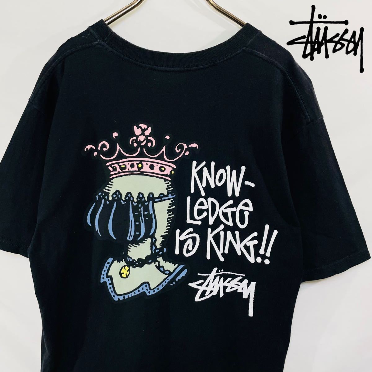 ステューシー バックプリント Tシャツ M 美品 ストリート クラウンロゴ STUSSY 両面プリント 半袖Tシャツ 黒 ブラック 騎士 グラフィックT