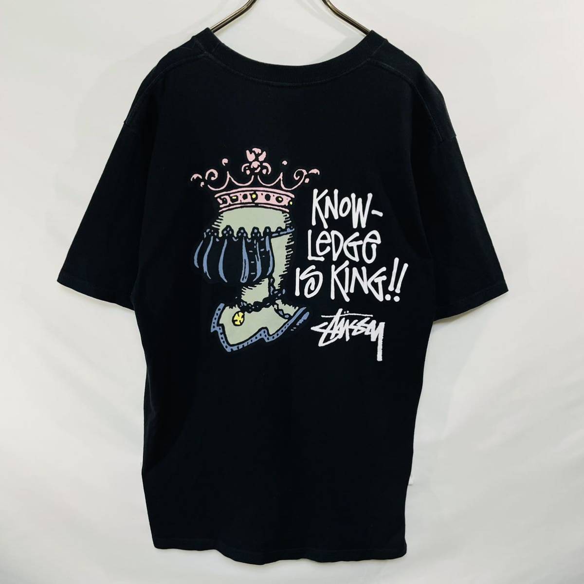 ステューシー バックプリント Tシャツ M 美品 ストリート クラウンロゴ STUSSY 両面プリント 半袖Tシャツ 黒 ブラック 騎士 グラフィックT