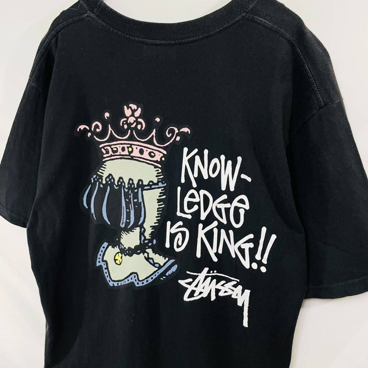 ステューシー バックプリント Tシャツ M 美品 ストリート クラウンロゴ STUSSY 両面プリント 半袖Tシャツ 黒 ブラック 騎士 グラフィックT