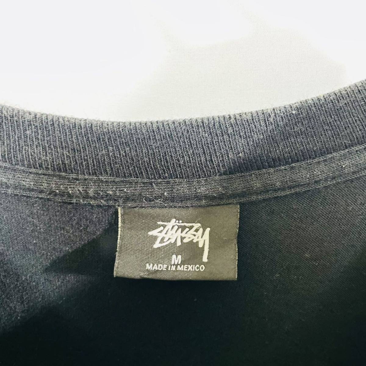 ステューシー バックプリント Tシャツ M 美品 ストリート クラウンロゴ STUSSY 両面プリント 半袖Tシャツ 黒 ブラック 騎士 グラフィックT