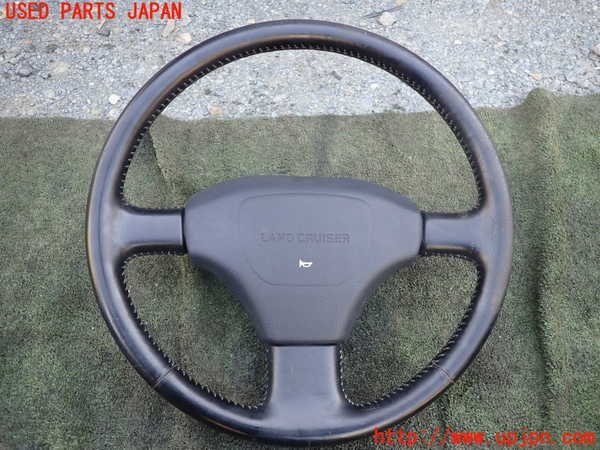 1UPJ-98657855]ランクル80系(FZJ80G)ステアリングホイール 中古