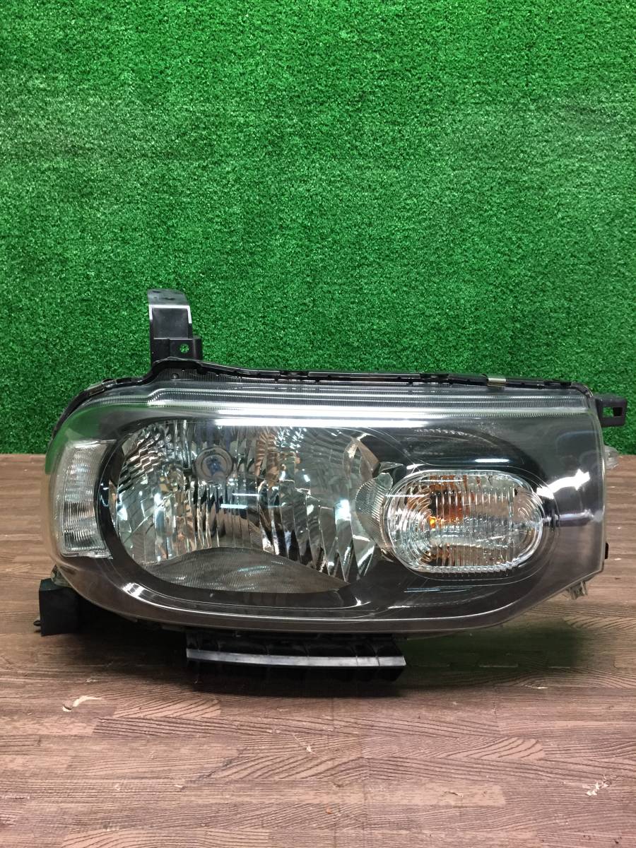 車 キューブ ヘッドライト ハロゲン STANLEY P8190 刻印 ZA