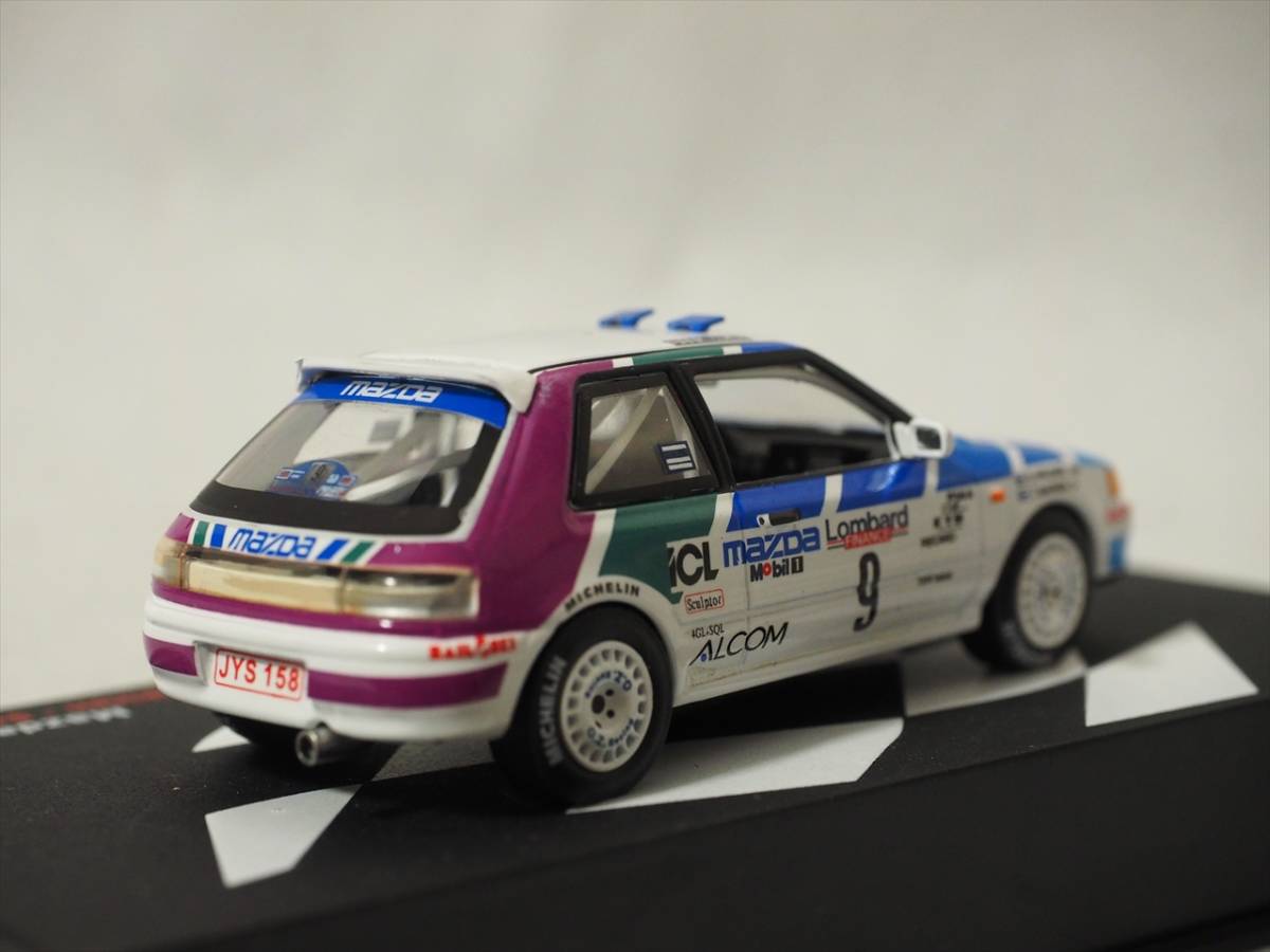 Miniature MAZDA 323 GTX #5 Rallye des 1000 Lacs 1990 IXOMODELS IXORAC358A | Collect World