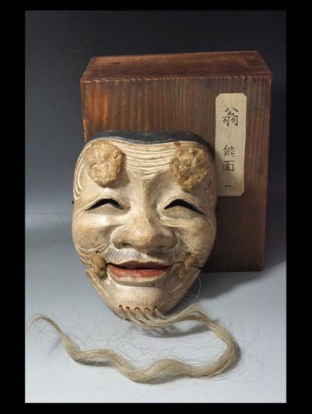 緑色の木製能面