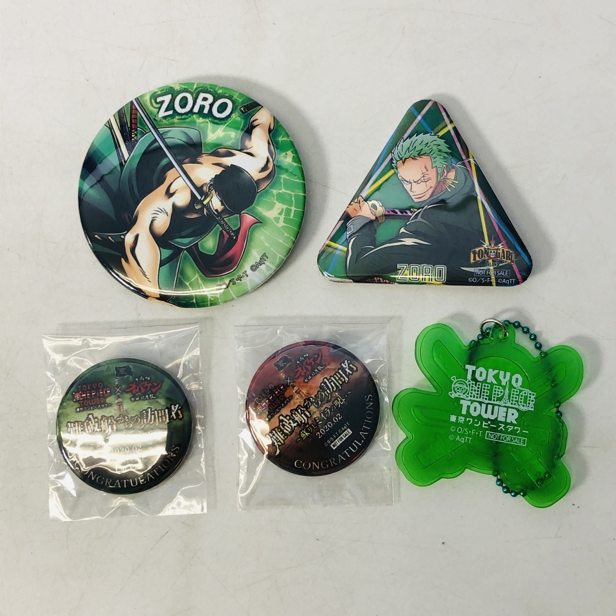 品 ワンピース 東京ワンピースタワー チケットホルダー ロロノア ゾロ 缶バッジ付き コミック アニメグッズ 売買されたオークション情報 Yahooの商品情報をアーカイブ公開 オークファン Aucfan Com