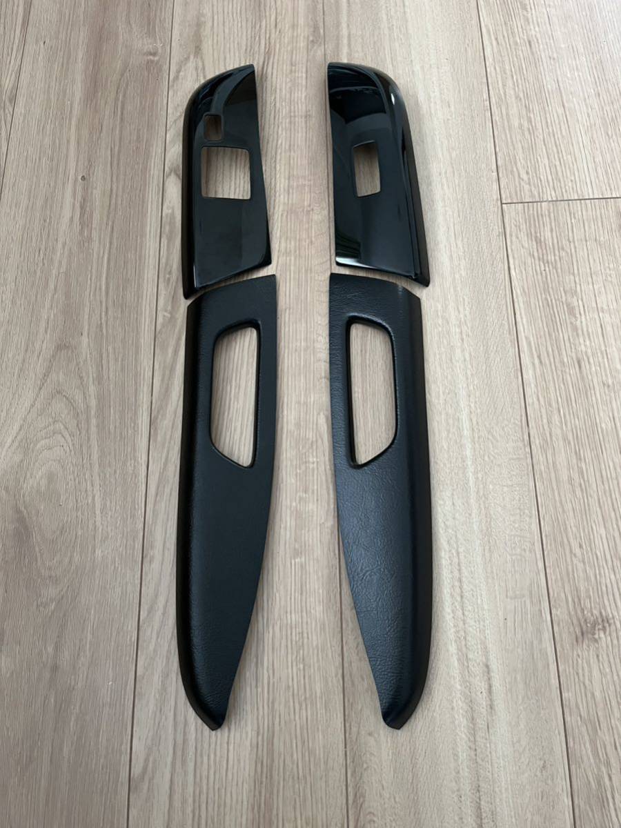 日産　NV350 キャラバン　ドアスイッチパネル　ブラック/革シボ　ボディライン