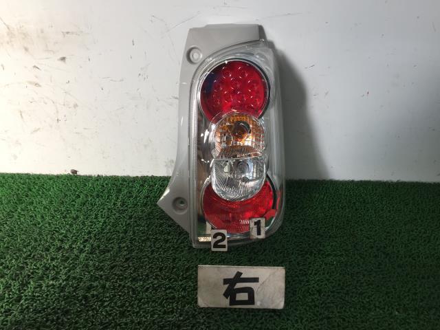 ラクティス DBA-NSP120 左ヘッドランプASSY X K411 -01A 070 52-274