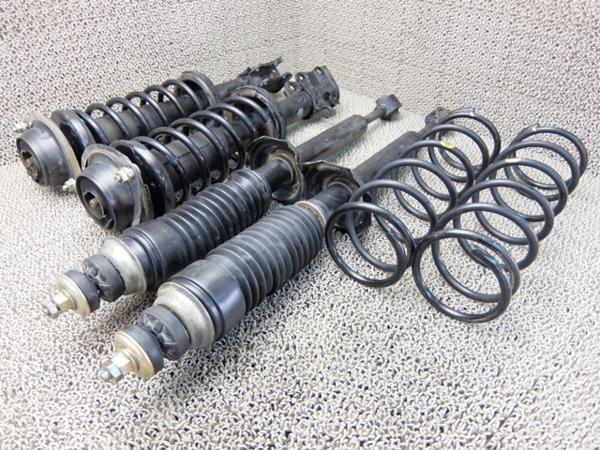 3168・デミオ DW3W DW5W 純正 ストラット 1台分セット 63408㎞