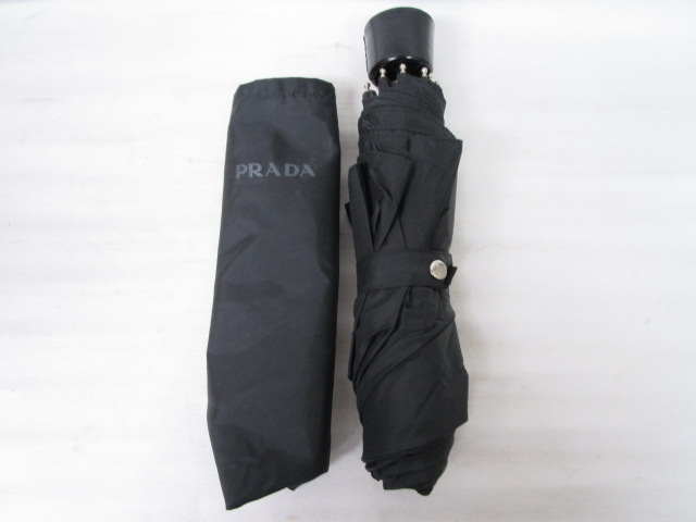 ○ PRADA プラダ 傘 折りたたみ傘 黒 中古 未使用？ PRADA(プラダ