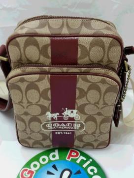COACH・コーチ】シグネチャーシリーズ ヘリテージストライプショルダー