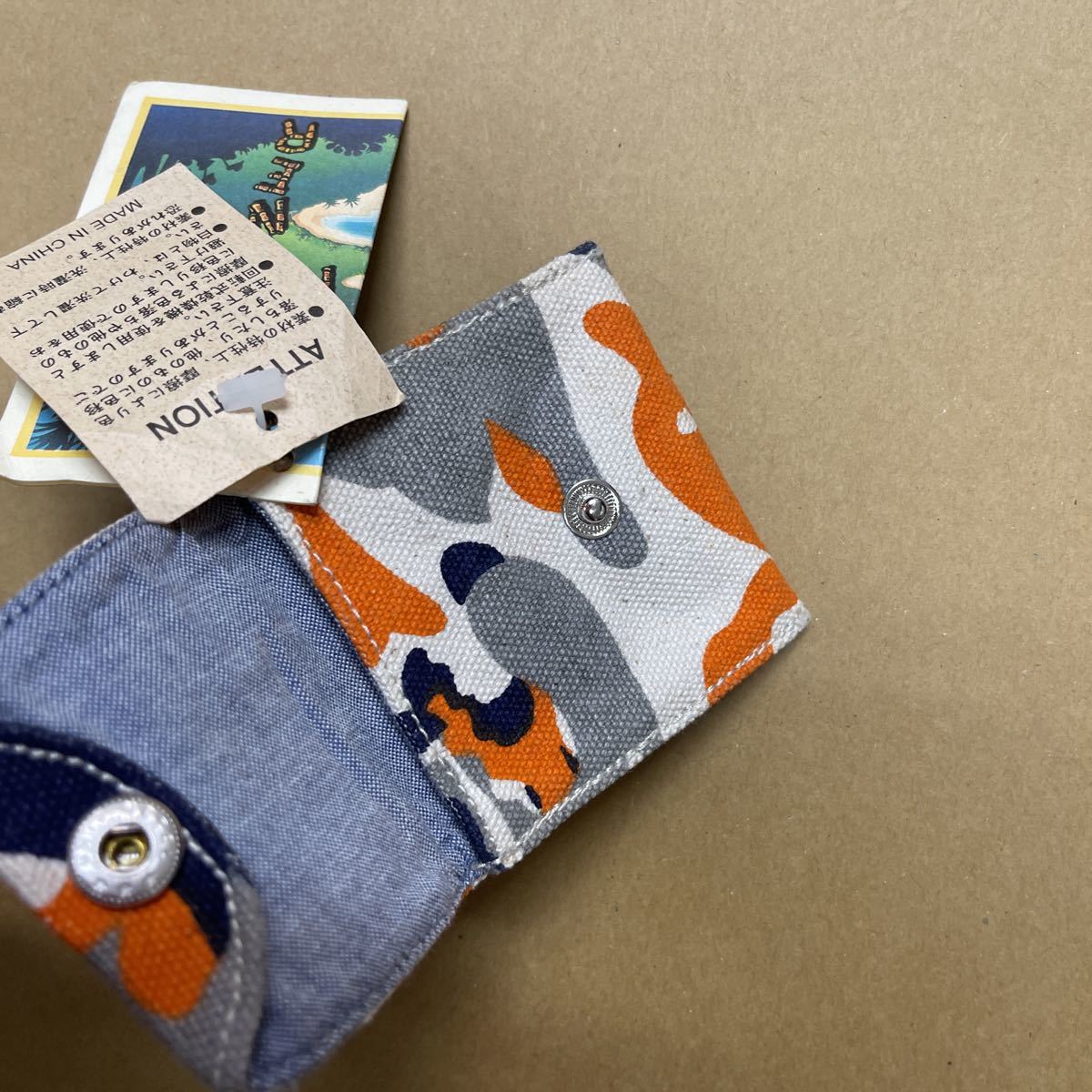 回転式コインケース オレンジ 池之端銀革店の「Cramp 回転式コインパース」 - 逸品