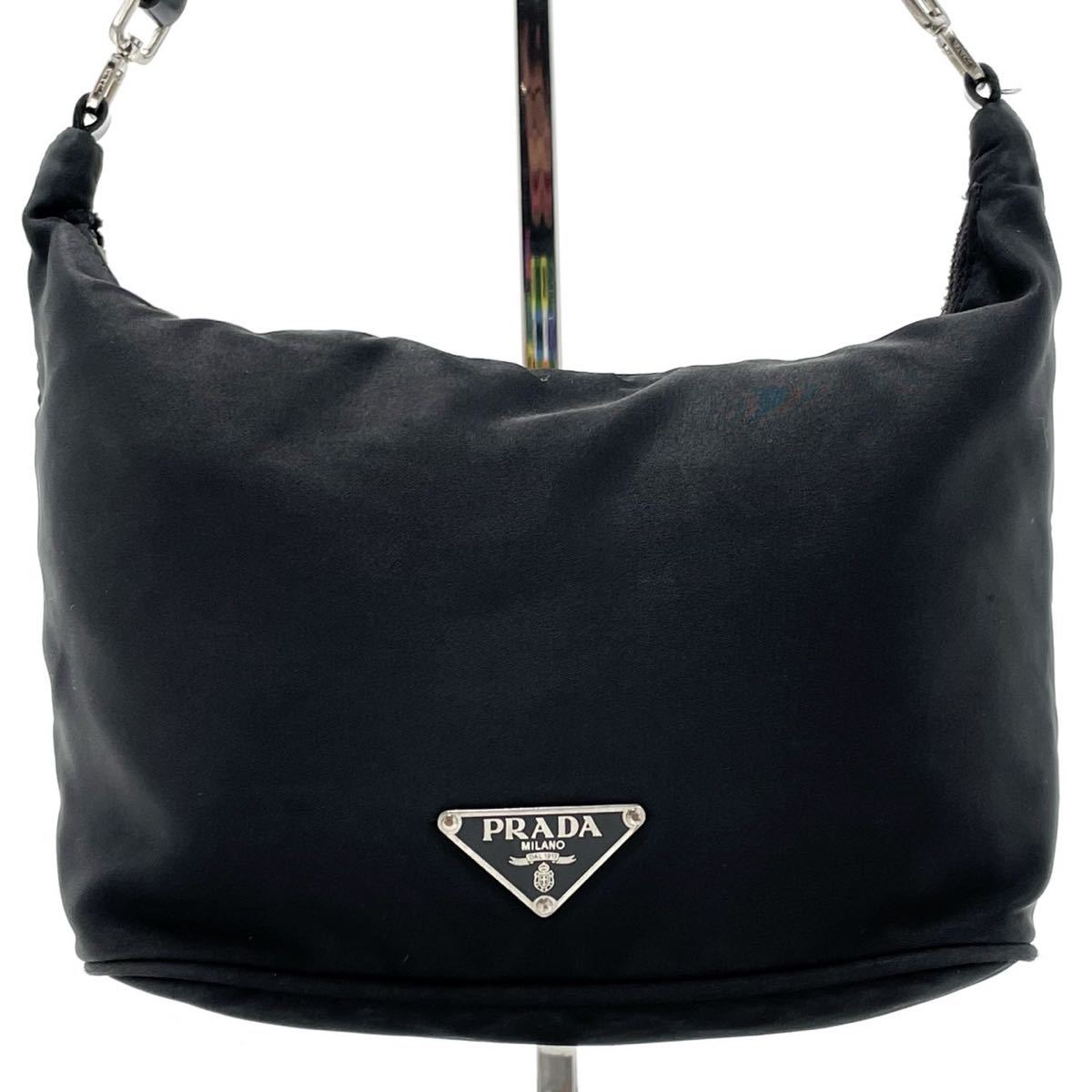 PRADA プラダ アクセサリーポーチ レディース 三角プレート 巾着 コインケース ポーチ ブラック QHH 1NR023 ナイロン GP金具 黒 プラダポーチ 小銭入れ