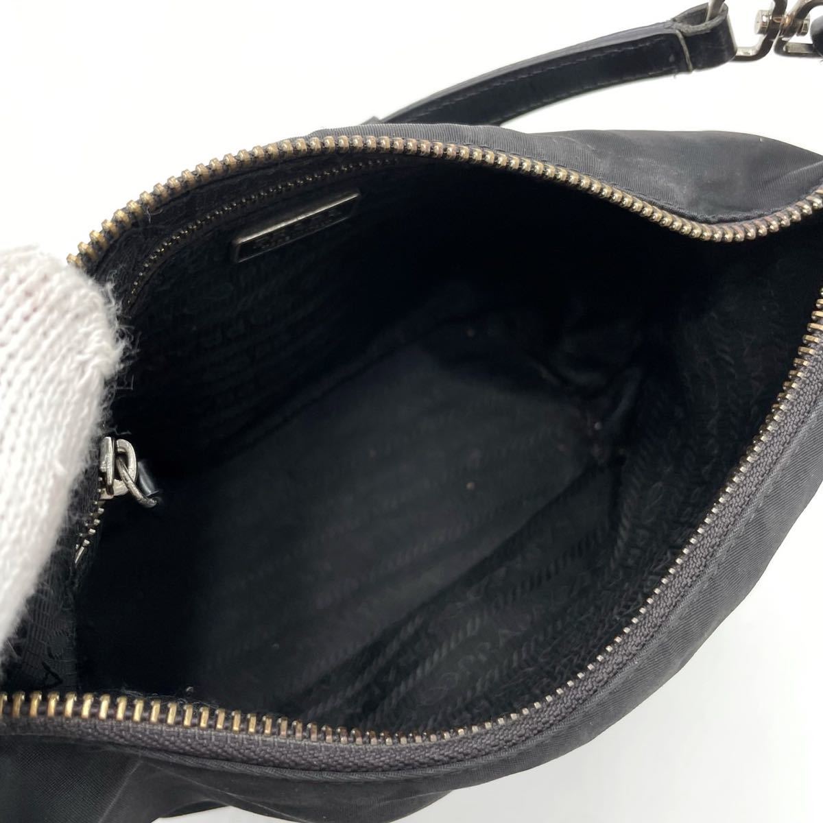 PRADA プラダ アクセサリーポーチ レディース 三角プレート 巾着 コインケース ポーチ ブラック QHH 1NR023 ナイロン GP金具 黒 プラダポーチ 小銭入れ